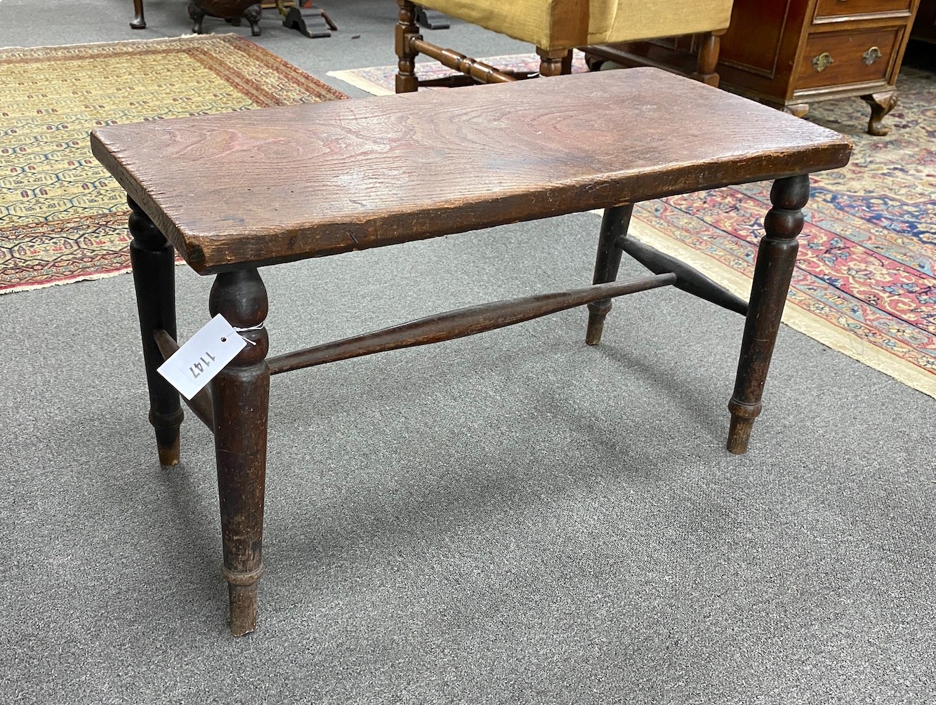A Thames Valley oak and beech stool, The seat stamped Holland & Sons, width 77cm